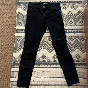 Mid high waisted distressed denim